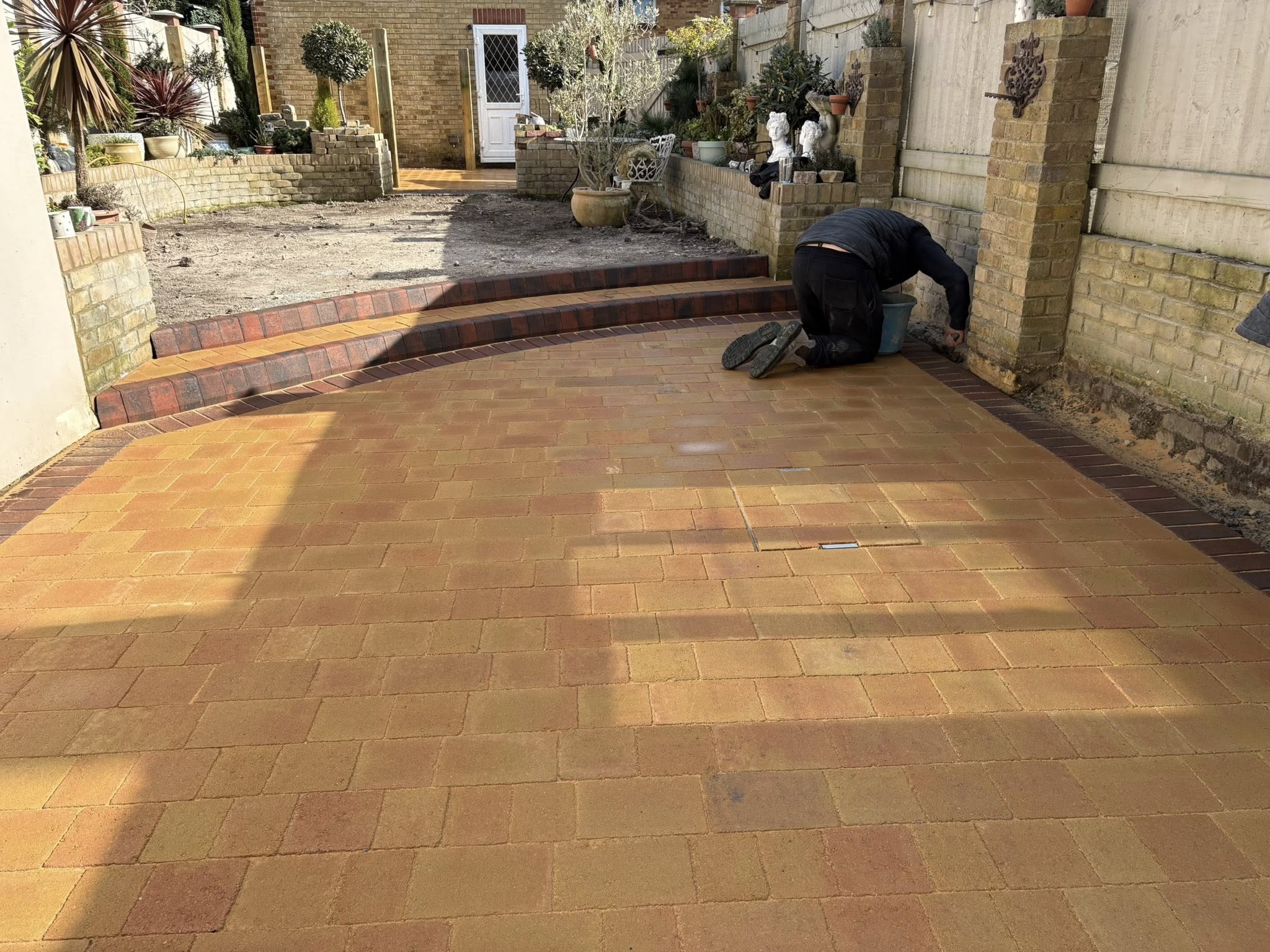 Installing brindle key kerb steps in the rear garden of a Victorian semi in Canterbury