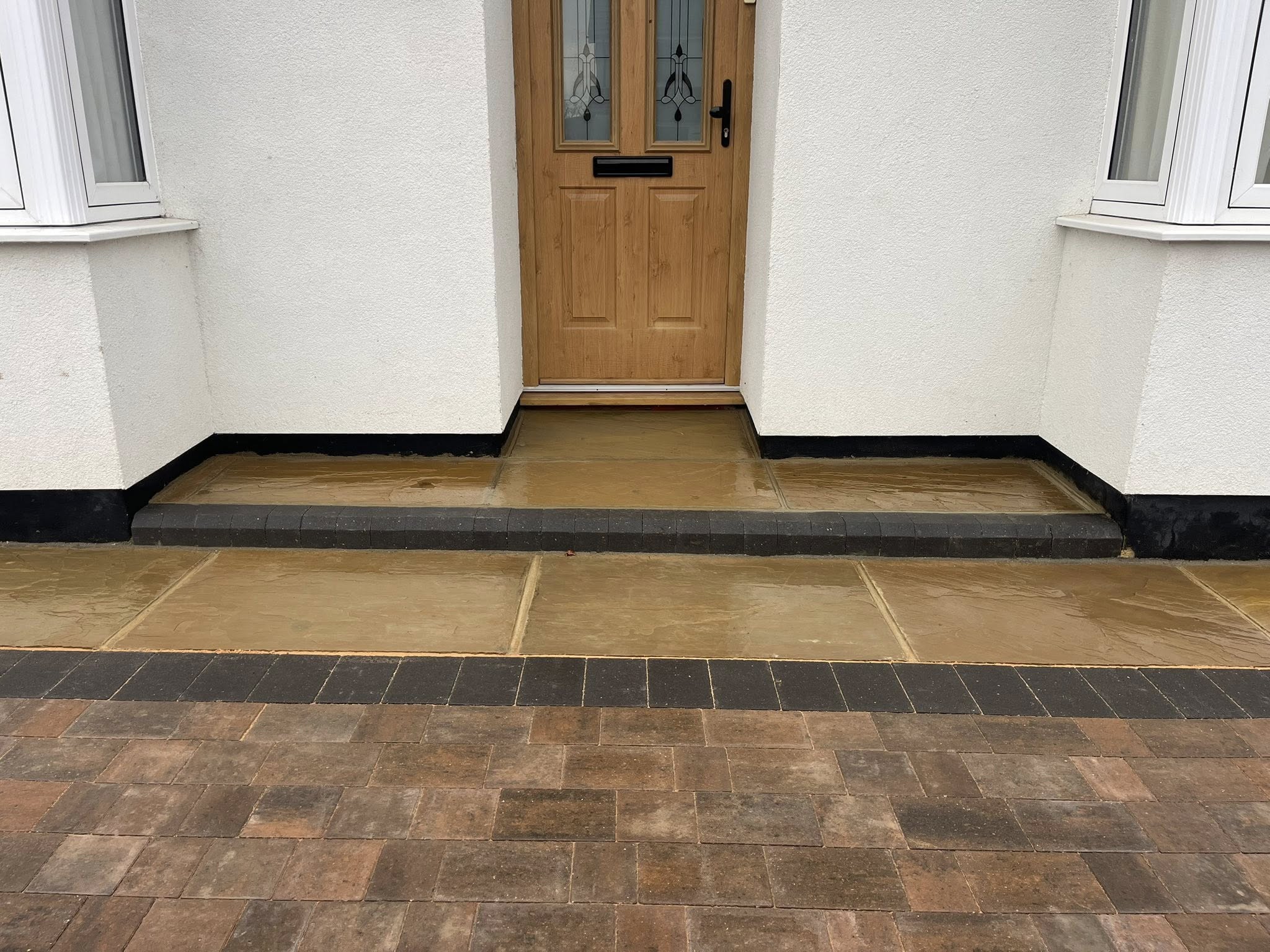 Indian sandstone steps integrated with block paving driveway Kent