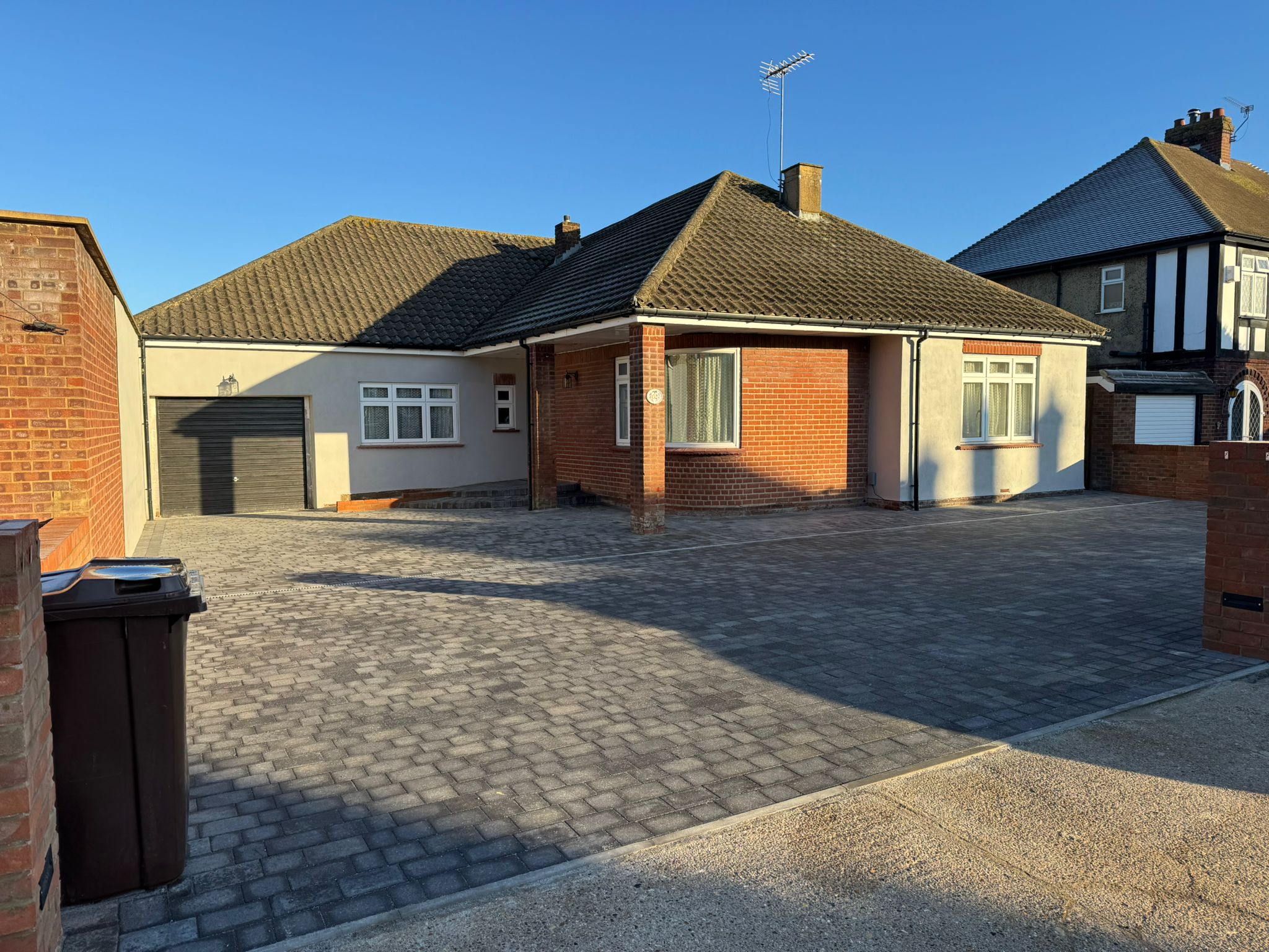 Completed grey block paving driveway in Rochester with stretcher bond pattern