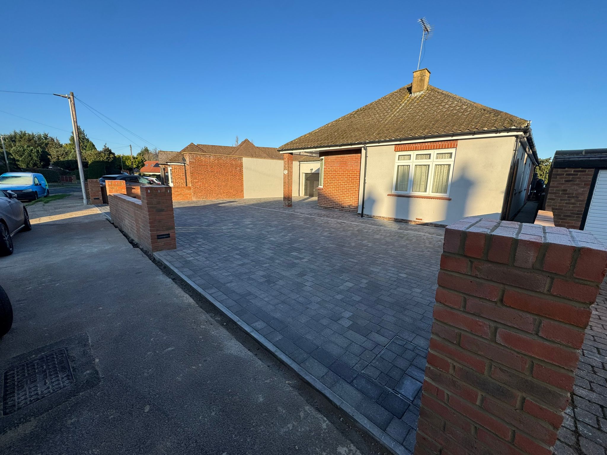 Brick retaining walls with integrated LED lighting for block paving driveway Rochester