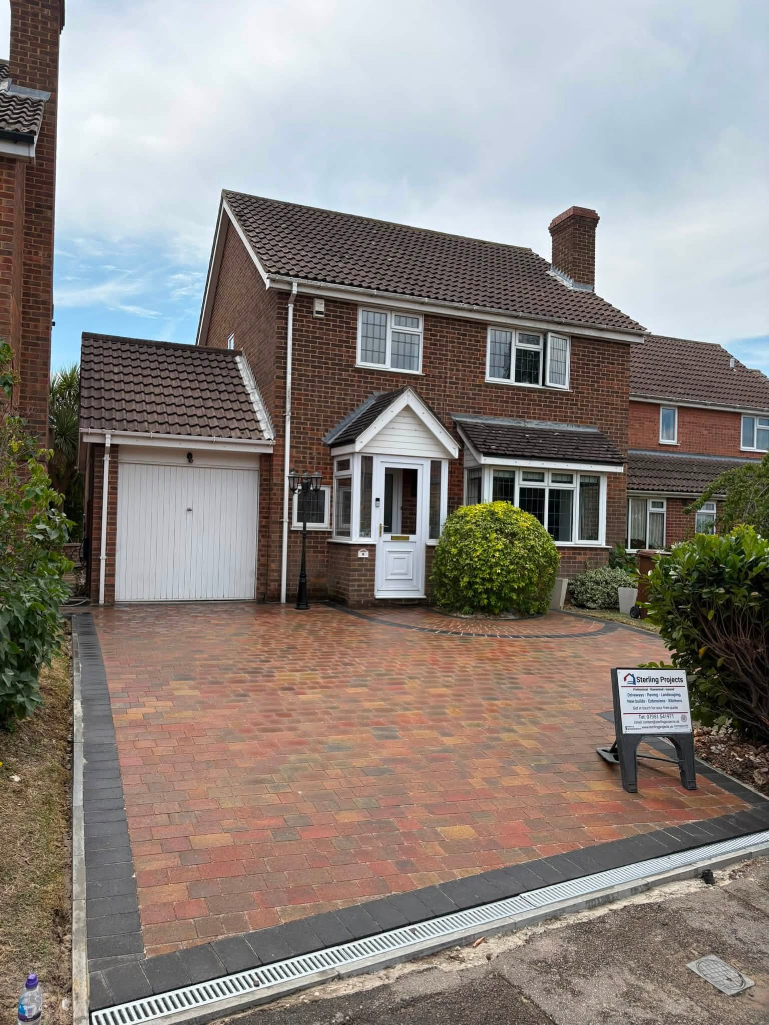 Full front view of a completed Beta Trio driveway with ACO drainage in Lordswood