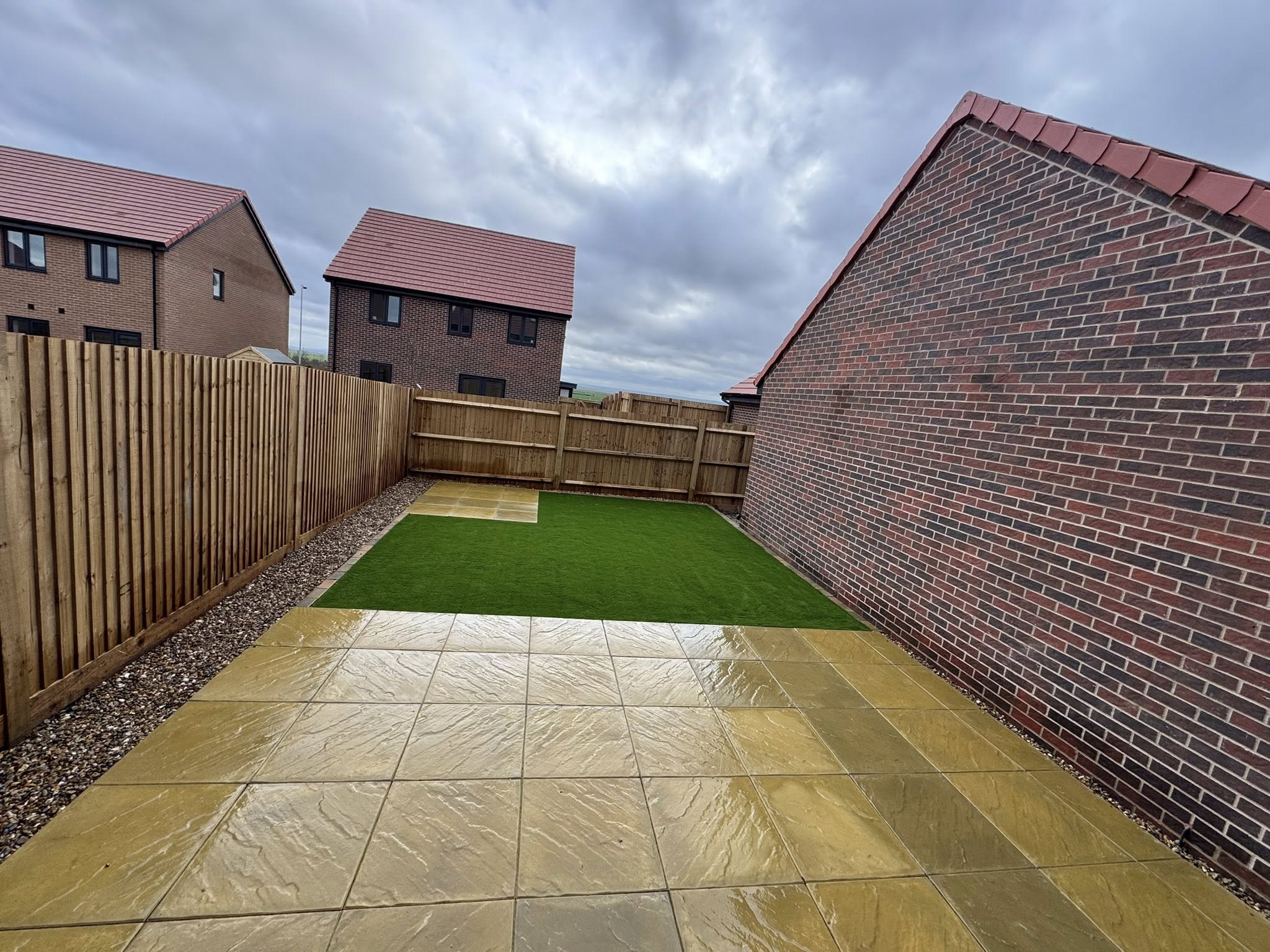 Garden Transformation in Minster - Artificial Grass and Brett Buff Patio