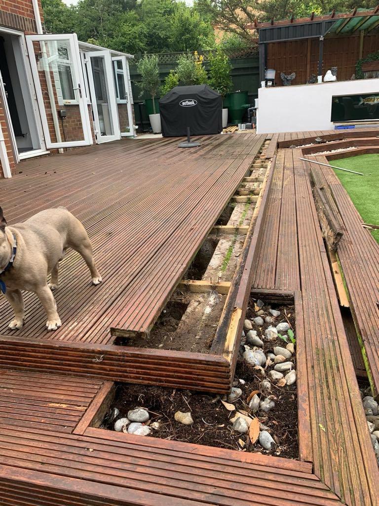 Removing old decking during renovation