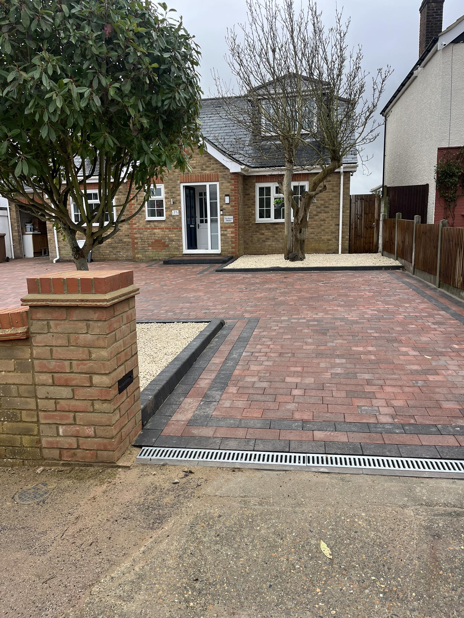 Integrated drainage system for red brick block paving driveway Rochester