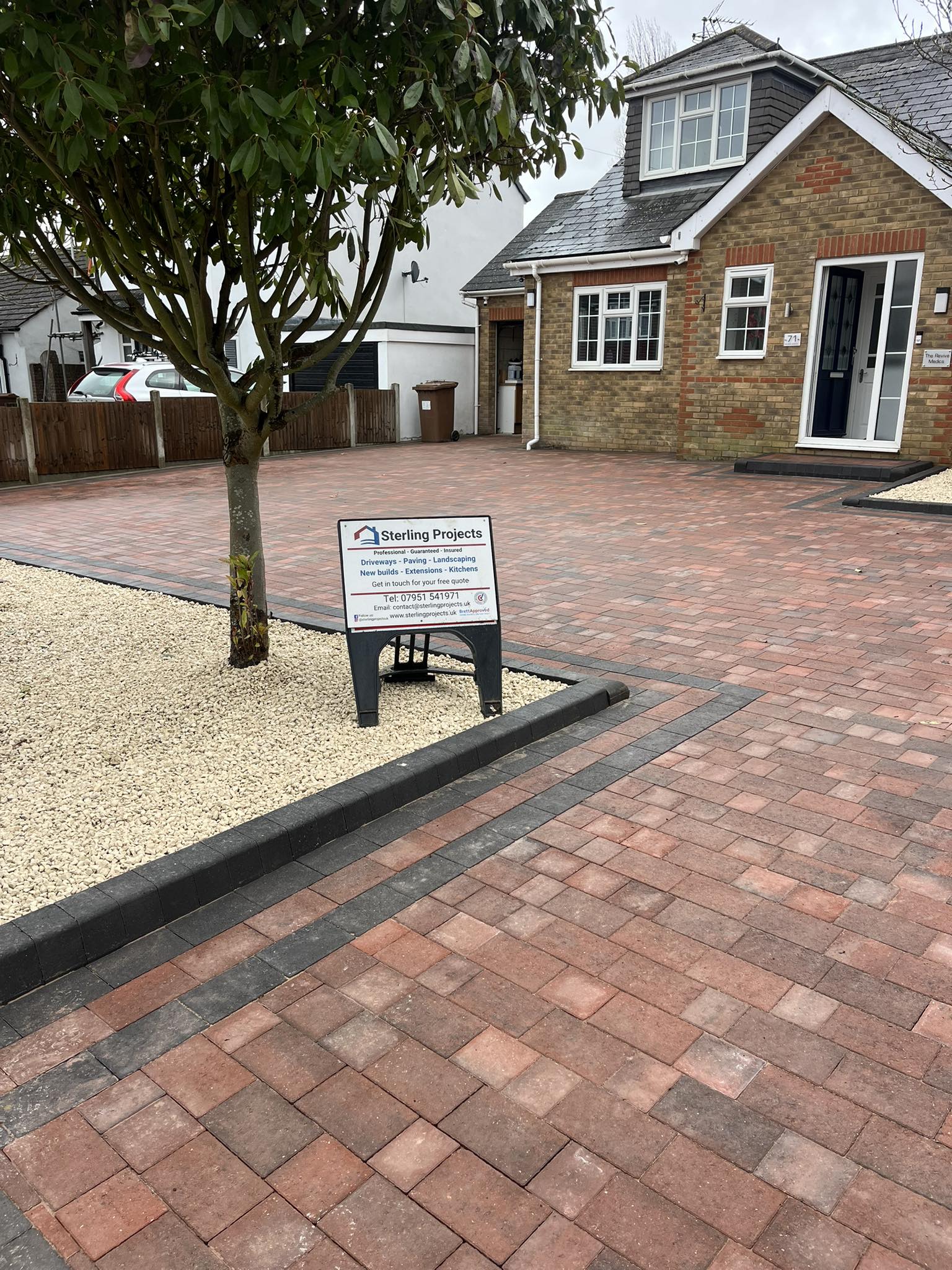 Red Block Paving Driveway Rochester - Black Border with Tree Landscaping